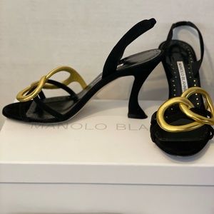 Manolo Blahnik black suede and gold link sandal in size 8.5